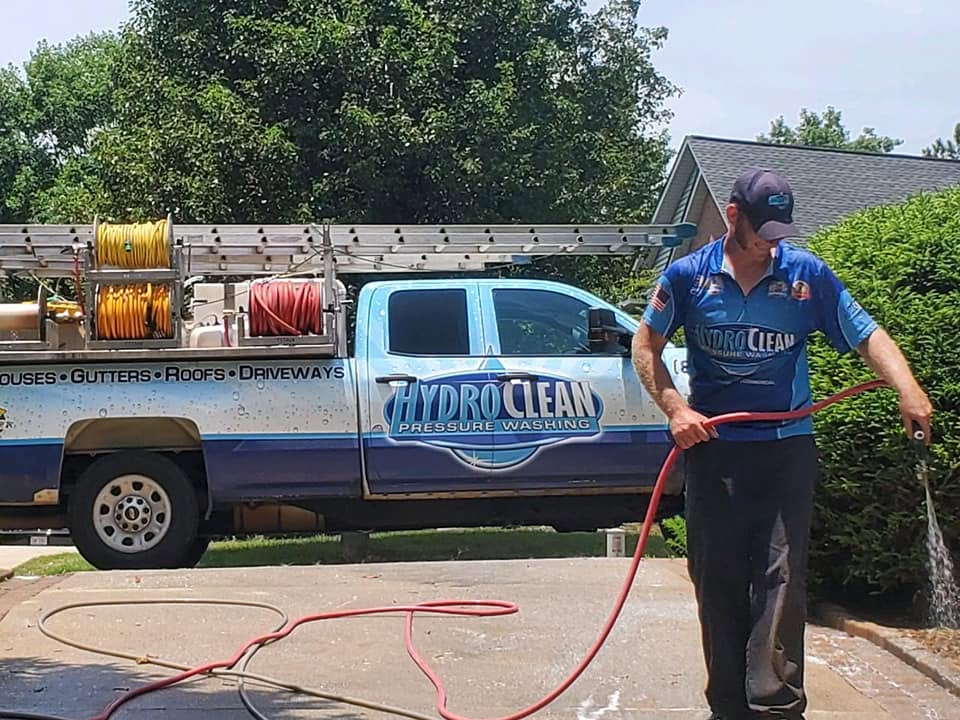 HydroClean technician with truck — commercial pressure washing Hickory NC