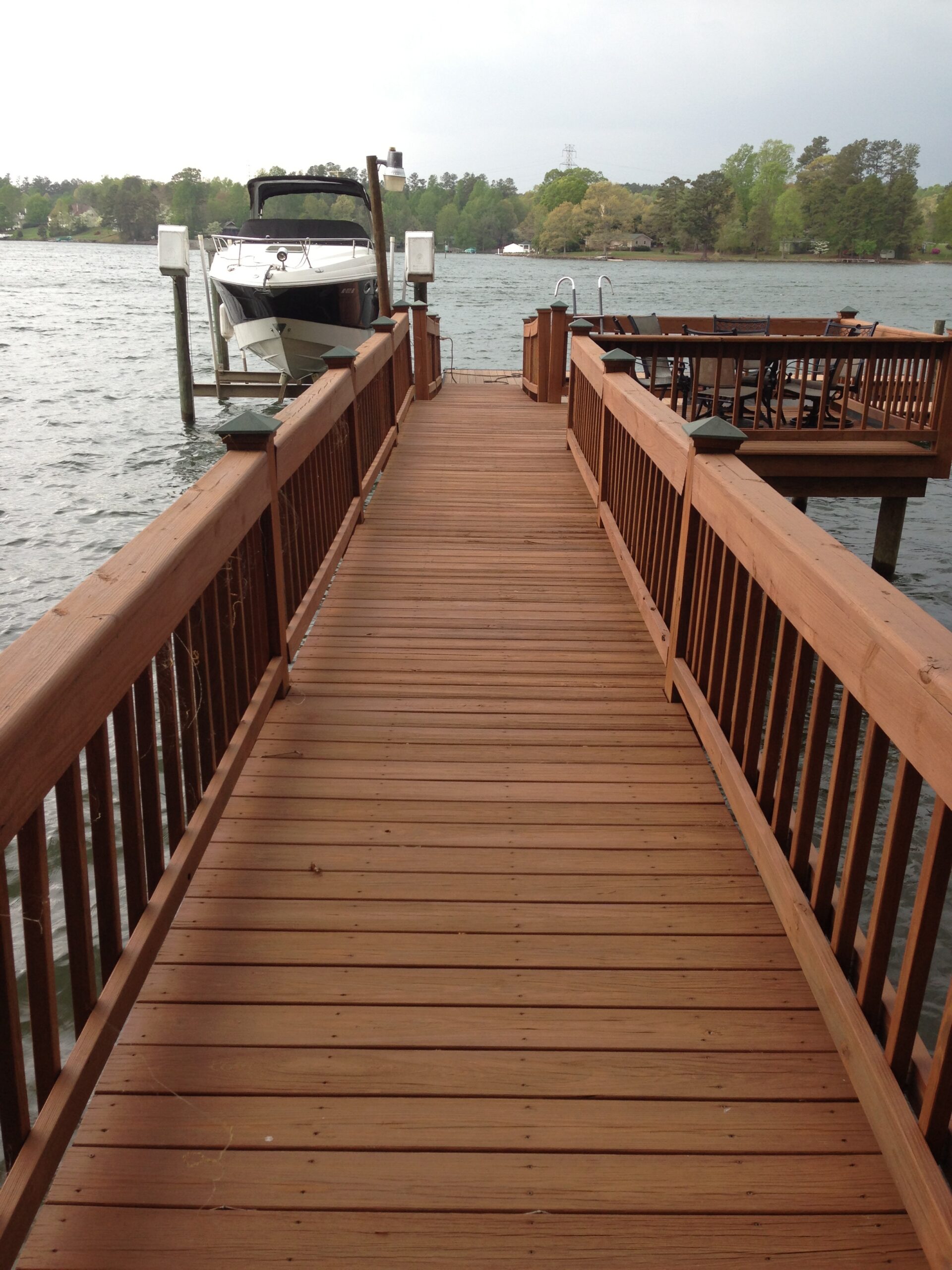 Restored lakefront dock after professional cleaning Lake Hickory NC
